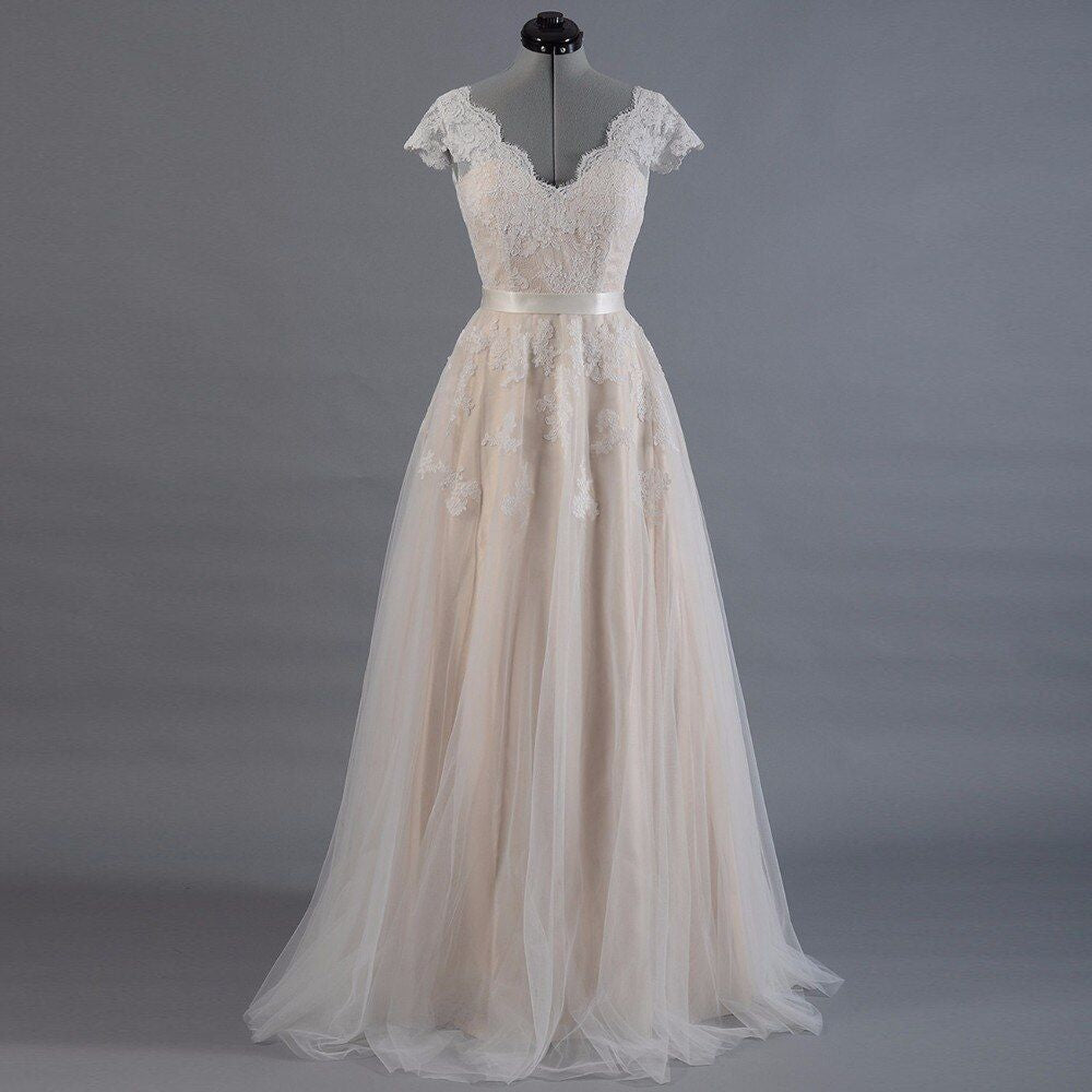 2024 Princess A-Line Wedding Dresses New Arrival Capped Sleeves Champagne Tulle Belt Bridal Gowns