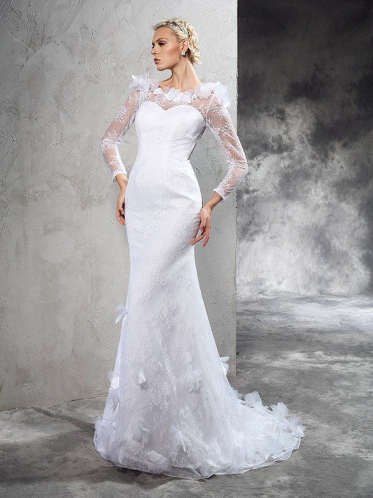 Sheath/Column Sheer Neck Hand-Made Flower Long Sleeves Long Satin Wedding Dresses CICIP0006923