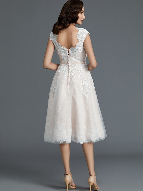 A-Line/Princess Sleeveless Bateau Knee-Length Tulle Wedding Dresses CICIP0006017