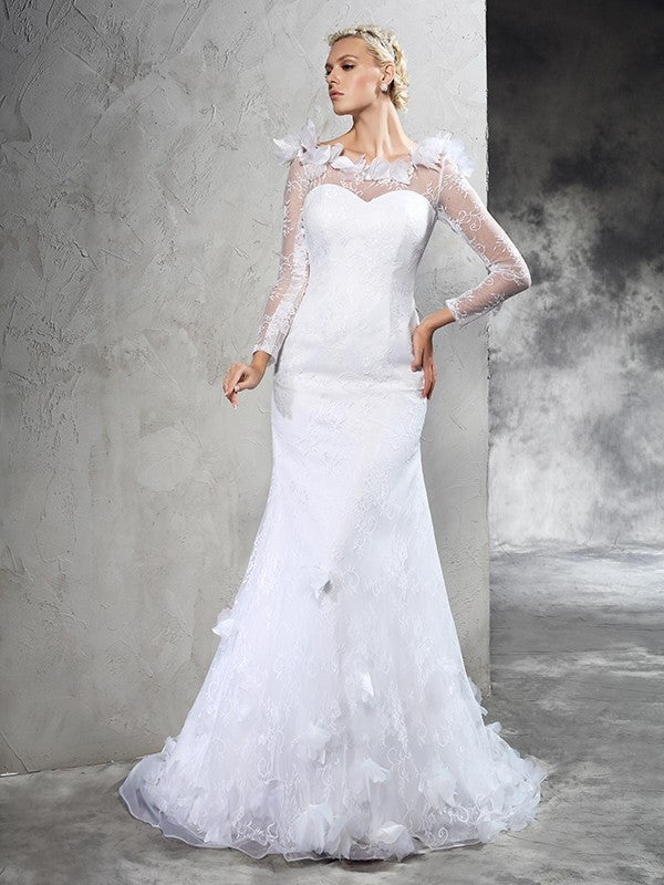 Sheath/Column Sheer Neck Hand-Made Flower Long Sleeves Long Satin Wedding Dresses CICIP0006923