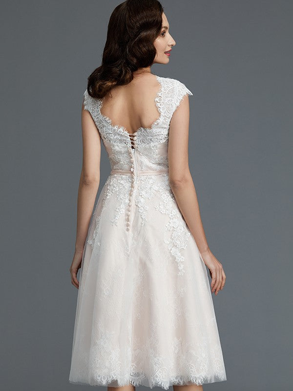 A-Line/Princess Sleeveless Bateau Knee-Length Tulle Wedding Dresses CICIP0006017